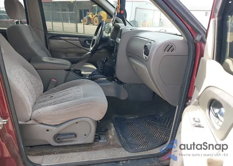 2004 GMC Envoy Sle z USA, uszkodzony, nr VIN 1GKDS13S042392703